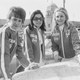 Drivers Alice Watson, Ginette Derolland, and Rosemary Smith of the Evening Standard team, with a map open on their Austin Maxi race car #74 during the 1970 London to Mexico World Cup Rally, UK, April 1970.